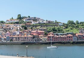 Miragaia Riverside Suites.