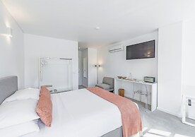 Miragaia Riverside Suites.