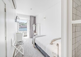 Miragaia Riverside Suites.