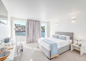 Miragaia Riverside Suites.