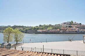 Miragaia Riverside Suites.