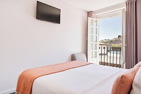 Miragaia Riverside Suites.