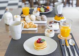 Miragaia Riverside Suites.