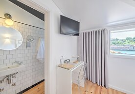 Miragaia Riverside Suites.