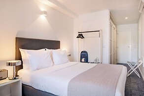 Miragaia Riverside Suites.