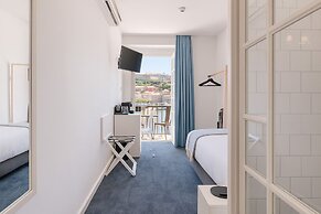 Miragaia Riverside Suites.