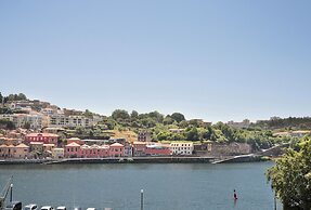 Miragaia Riverside Suites.