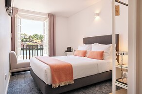 Miragaia Riverside Suites.