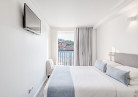 Miragaia Riverside Suites.