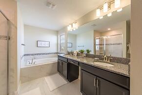 Champions Gate Luxury ! 6 Bedroom Home by RedAwning