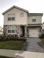 Champions Gate Luxury ! 6 Bedroom Home by RedAwning