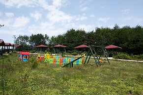 Flora Handüzü Resort & Wellness Bungalow Hotel