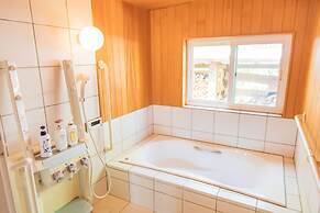 Izu House Luxury Log with Cozy Fireplace