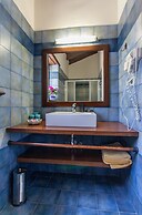 Dine on the Generous Veranda at a Rustic Stone Getaway