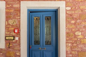 Dine on the Generous Veranda at a Rustic Stone Getaway