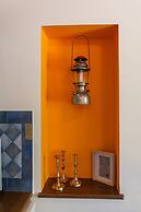 Dine on the Generous Veranda at a Rustic Stone Getaway