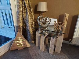 Jonstone Pines Lodge at Cayton Bay Holiday Park