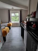 Grey Stone Studio Apartments