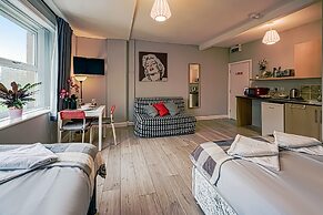 Grey Stone Studio Apartments