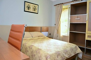 Quiet Pools Inn and Residence