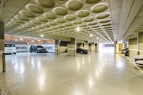 Brown Dot Hotel Minam