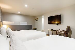 Brown Dot Hotel Minam