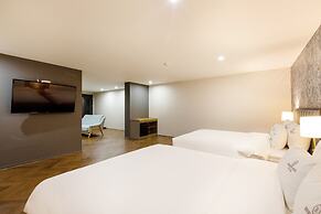Brown Dot Hotel Minam