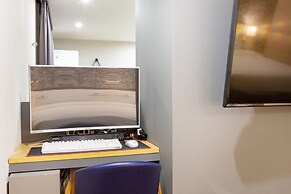 Brown Dot Hotel Minam