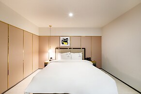 Brown Dot Hotel Minam