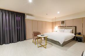 Brown Dot Hotel Minam