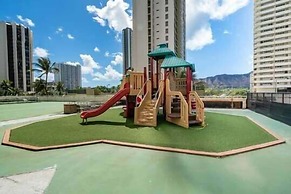 Waikiki Banyan Condo Located One Block From Waikiki Beach! by Koko Res