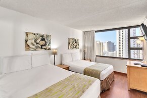 Waikiki Banyan Condo Located One Block From Waikiki Beach! by Koko Res
