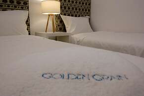 Golden Grain Suites by Checkin