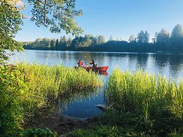 Tiny hut in the Forest Overlooking the River