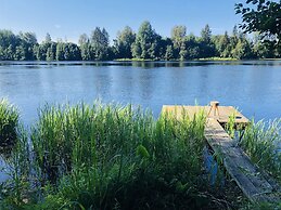 Tiny hut in the Forest Overlooking the River