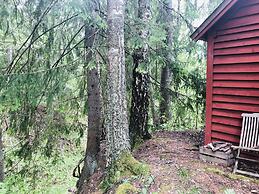 Tiny hut in the Forest Overlooking the River