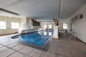 Minimalist and Cozy 1BR Apartment at The Boulevard