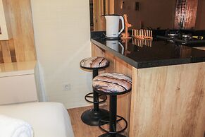 Minimalist and Cozy Studio Room at Ayodhya Apartment