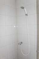 Minimalist Studio Apartment at Poris 88 with City View