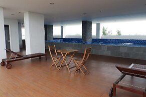 Minimalist Studio Apartment at Poris 88 with City View