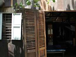 Peaceful Homestay in the Middle of Fruit Garden - Room With Four Doubl