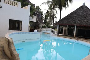 Room-a Wonderful Beach Property in Diani
