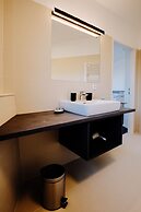 URBAN ISLAND - Riverside Apartments