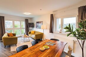 URBAN ISLAND - Riverside Apartments