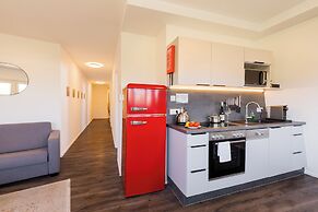 URBAN ISLAND - Riverside Apartments