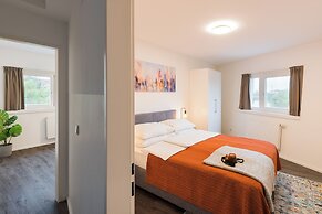 URBAN ISLAND - Riverside Apartments