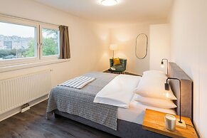 URBAN ISLAND - Riverside Apartments