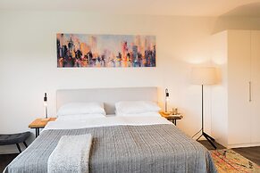 URBAN ISLAND - Riverside Apartments