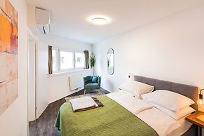 URBAN ISLAND - Riverside Apartments