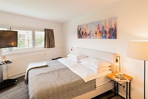 URBAN ISLAND - Riverside Apartments